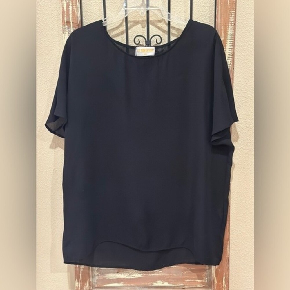 Women’s black silky top